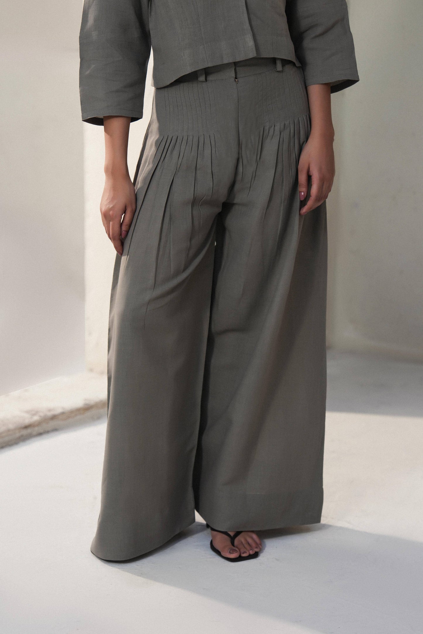 Women's linen wide leg tucked pants - front view
